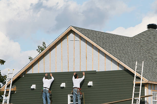 Professional Emergency Siding Repair technician working in Port Jefferson, NY